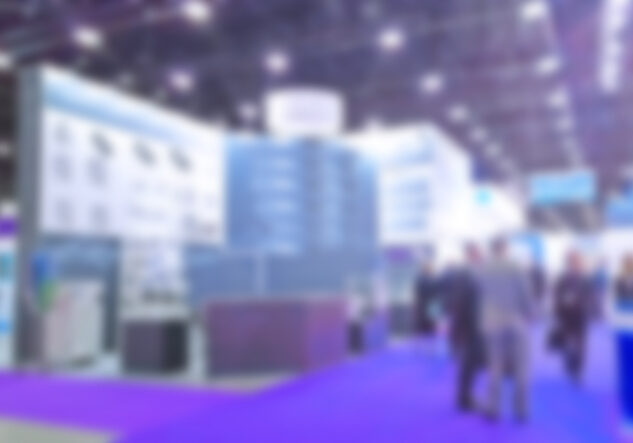 Abstract blur people in trade show background. New modern exhibition, convention and conference expo centre. Venue for holding business. Financial and economic growth and crisis concept. Collaboration